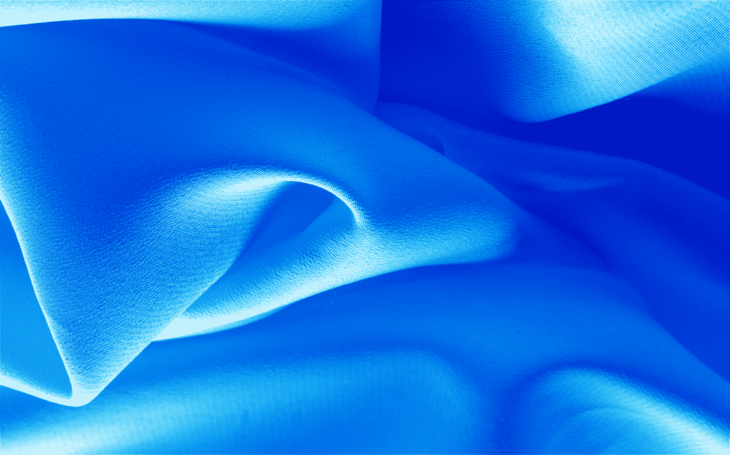 A swatch of a light and shiny blue Oxford fabric.