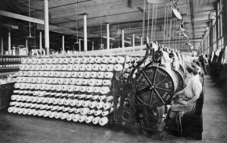 Women working on textile machines from the First Industrial Revolution
