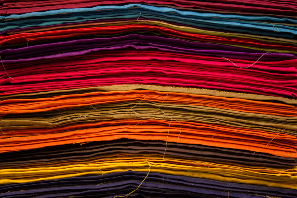 Textile fibers: Pieces of fabric with different colors.