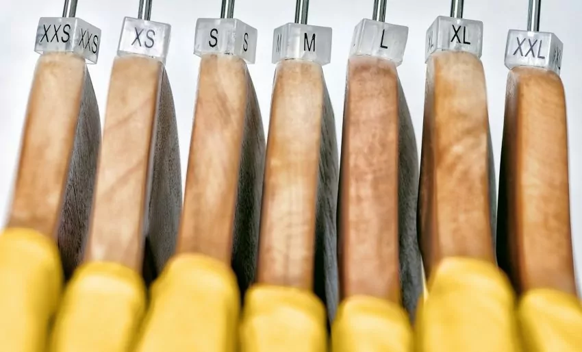 Hangers displaying clothing sizes