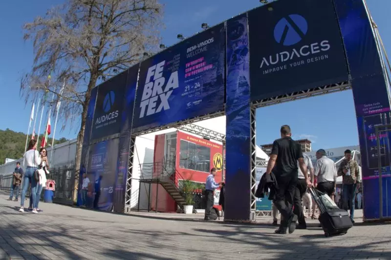 The image shows the entrance to a textile fair