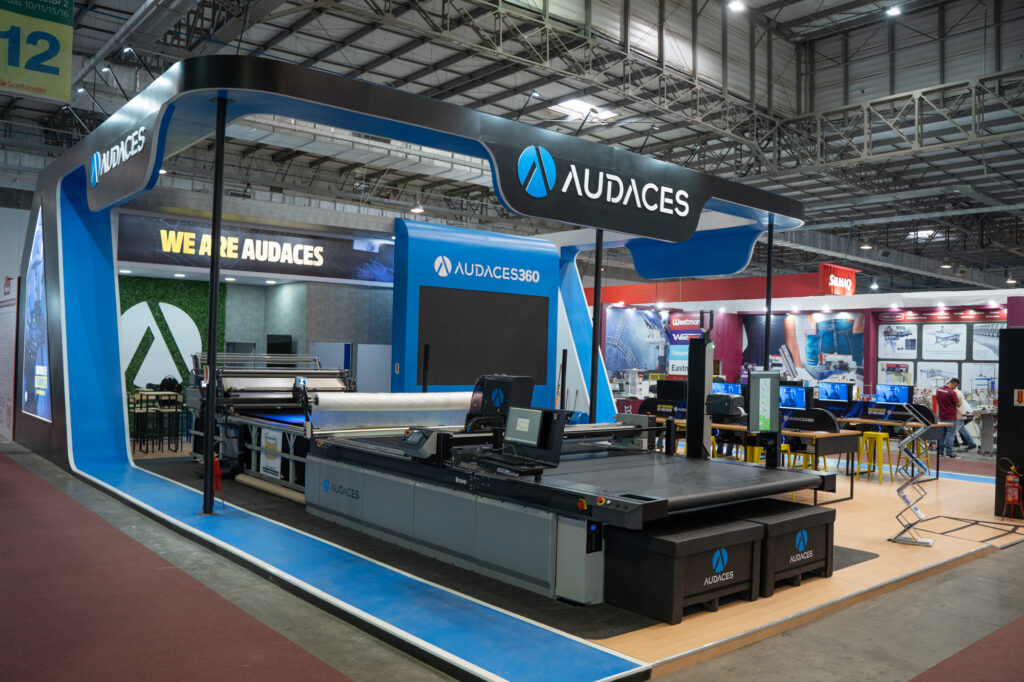 The image shows the Audaces booth at the Febratex textile fair
