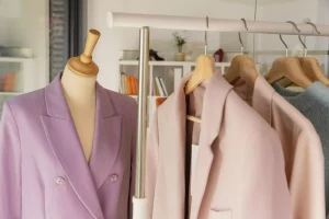 The image shows a fashion visual merchandising display on a store