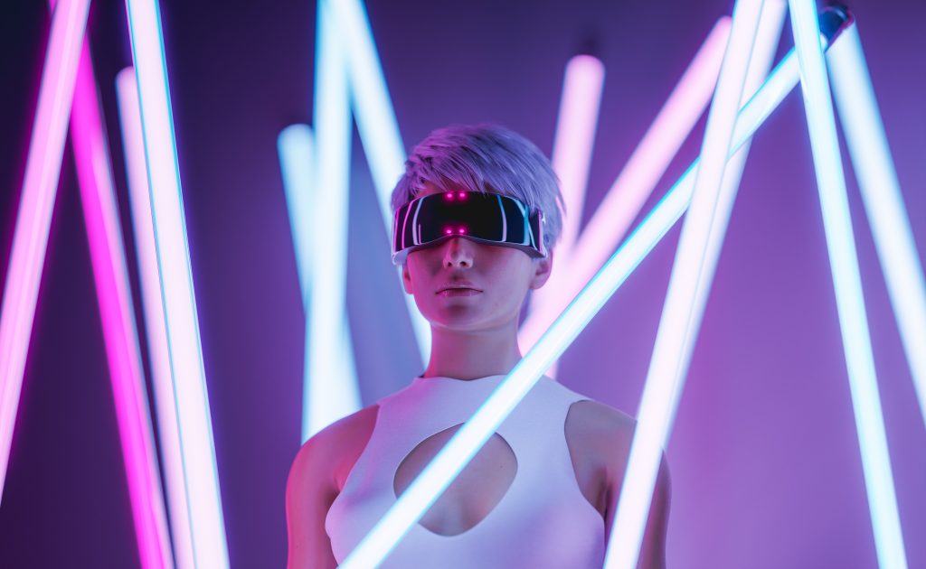 Futuristic fashion: Woman in an environment with LED lamps using 3D glasses with lights passing through the screen.