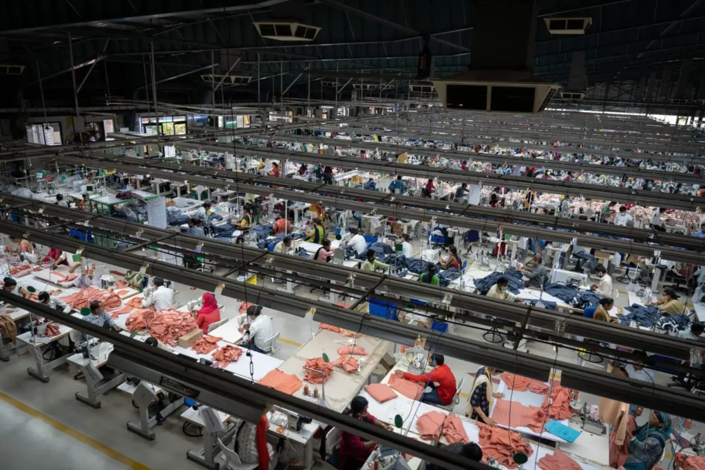 Ethical fashion: Image shows working conditions in a textile factory.