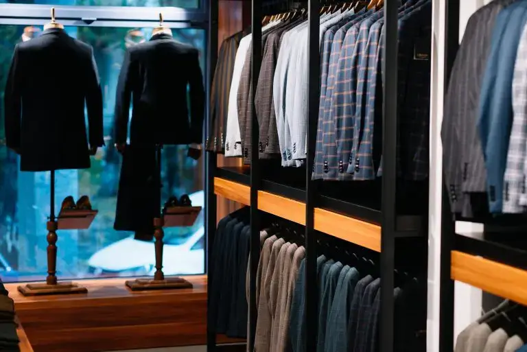 Men fashion online: Store displaying shirts and pants.