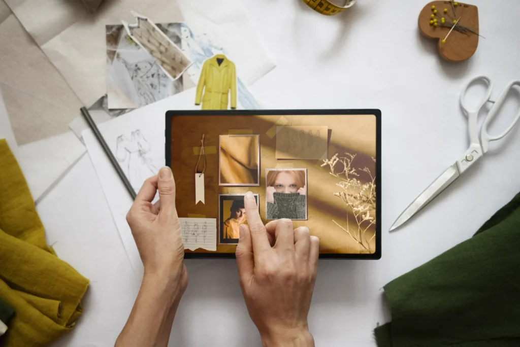 How to create a moodboard: Woman gathering visual references on a tablet.
