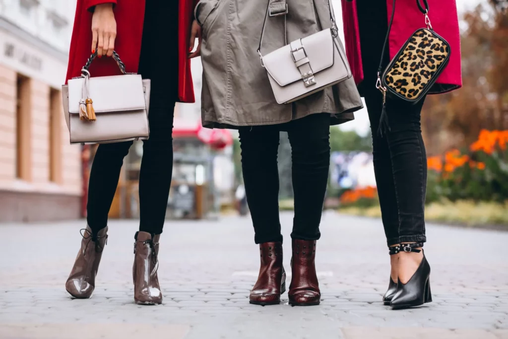 Bag rental: Three women displaying their rented bags for special occasions.