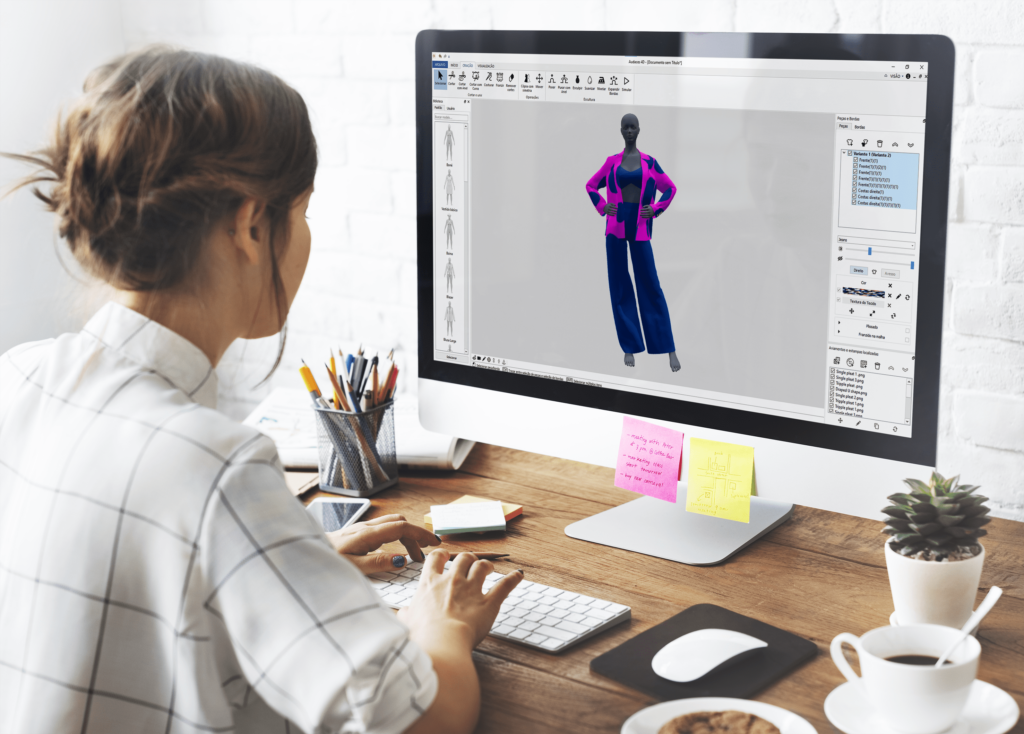 A fashion designer developing a 3D garment sample on the computer using a fashion CAD.