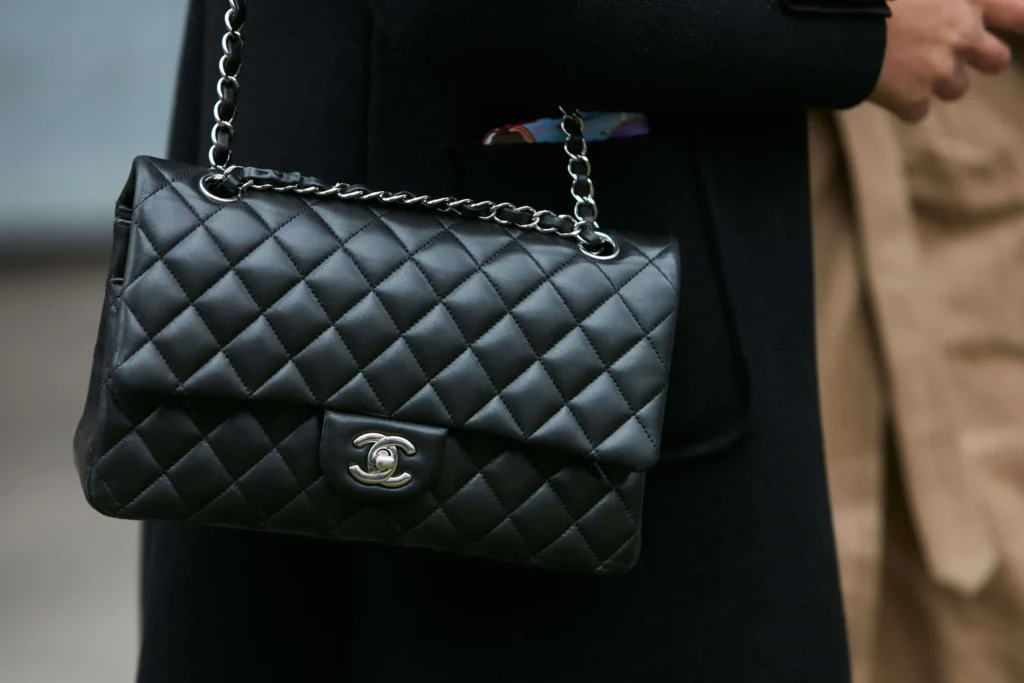 Woman wearing the iconic Chanel Flap Bag