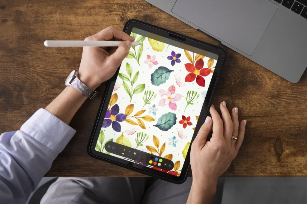 A person creating a digital print-on-demand clothing on a tablet
