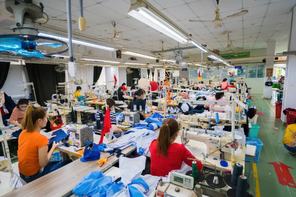 Employees working in a mass production industry.