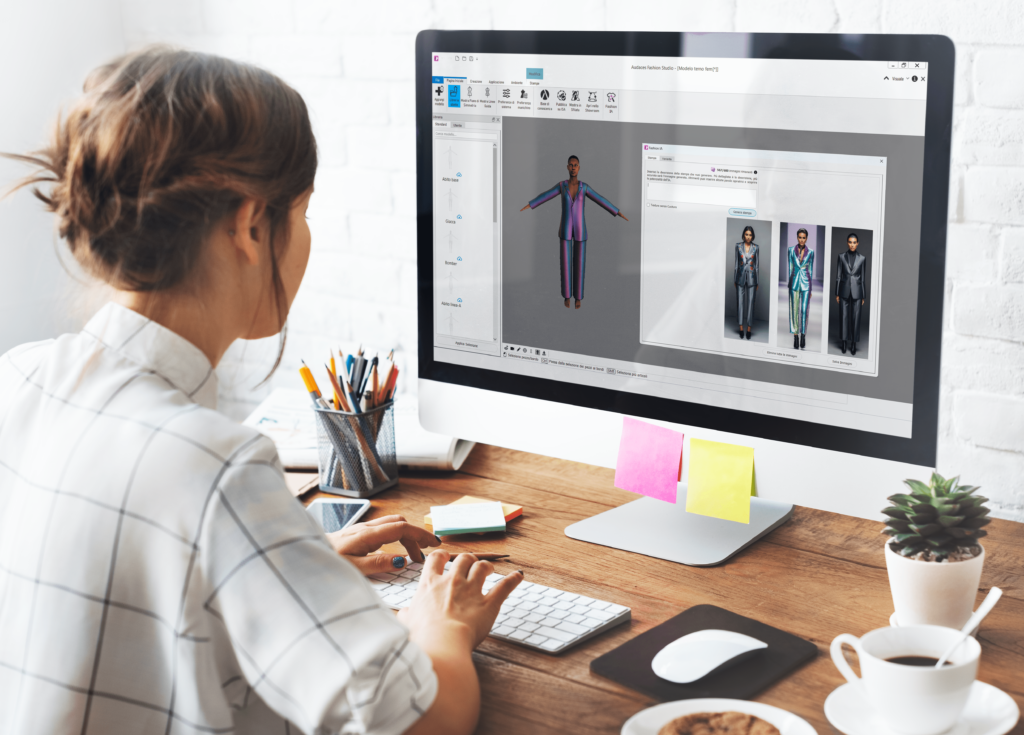 A fashion designer using technology to create a digital sketch.