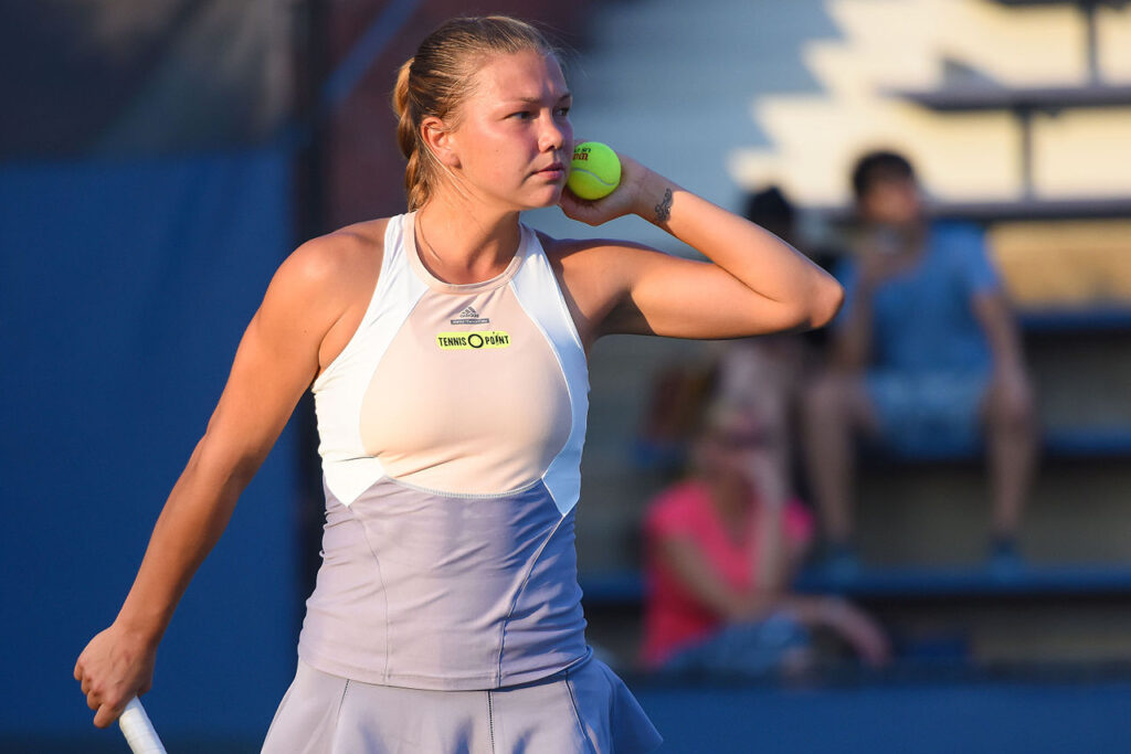 Tennis athlete wearing a uniform designed by Stella McCartney for Adidas.