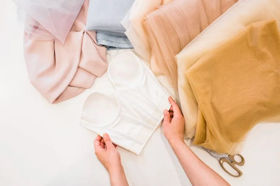 A fashion professional choosing the best fabric for her lingerie patterns.