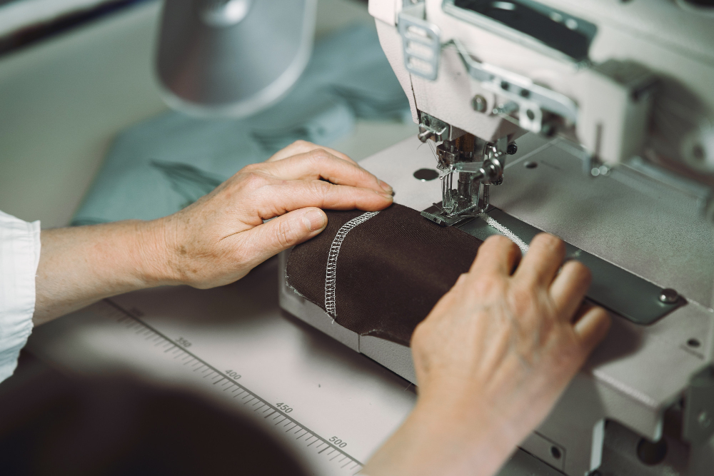 An overlock machine, which is one of the most commonly used types of sewing in the industry.