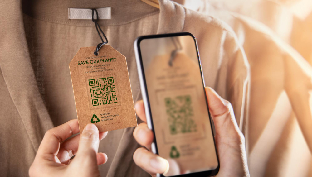 Digital product passport: a client scanning a QR code on a garment's tag.