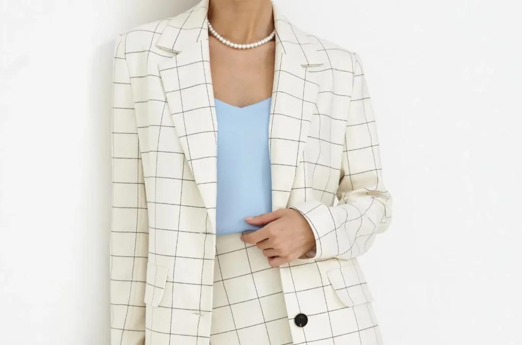 Plaid print: a woman wearing a white plaid matching set.