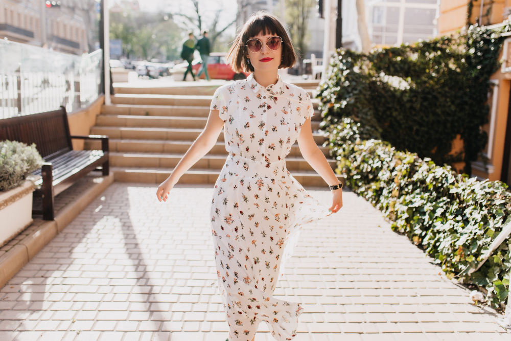 Surface design: a woman wearing a patterned dress.