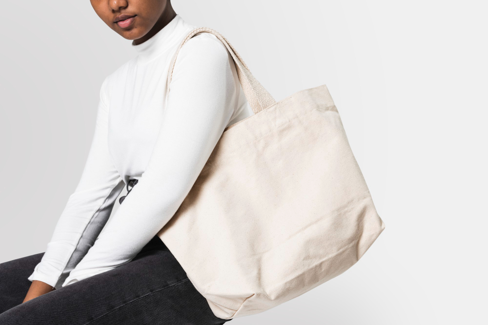 Tote bag pattern: a woman wearing a cotton tote bag.