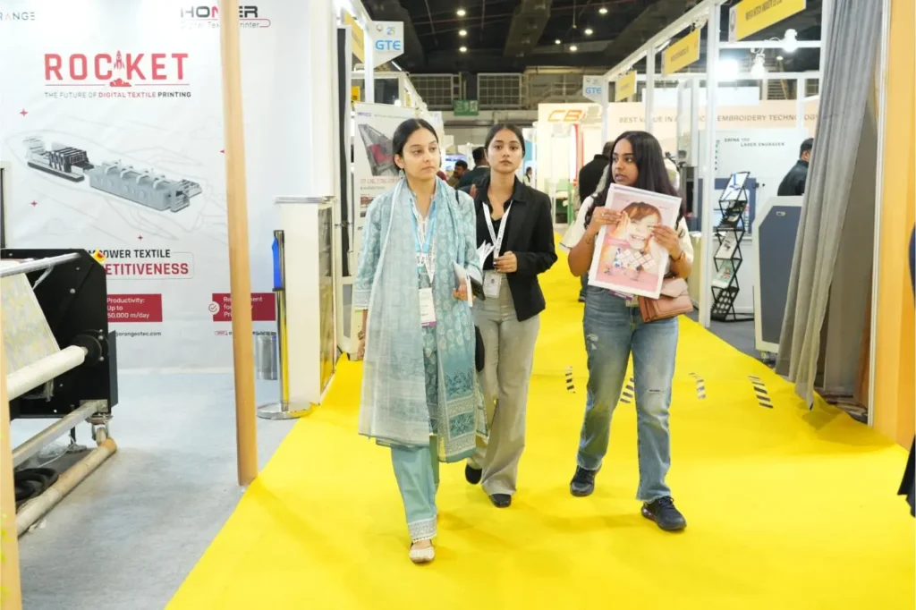 Garment Technology Expo: visitors walking through the stands.