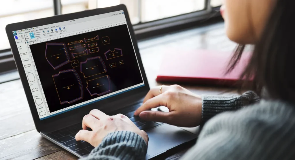 Pattern making software: a fashion professional using Audaces Pattern.