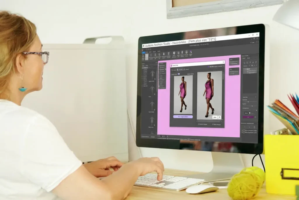 Stilista di moda che utilizza un software per progettare modelli 3D online.